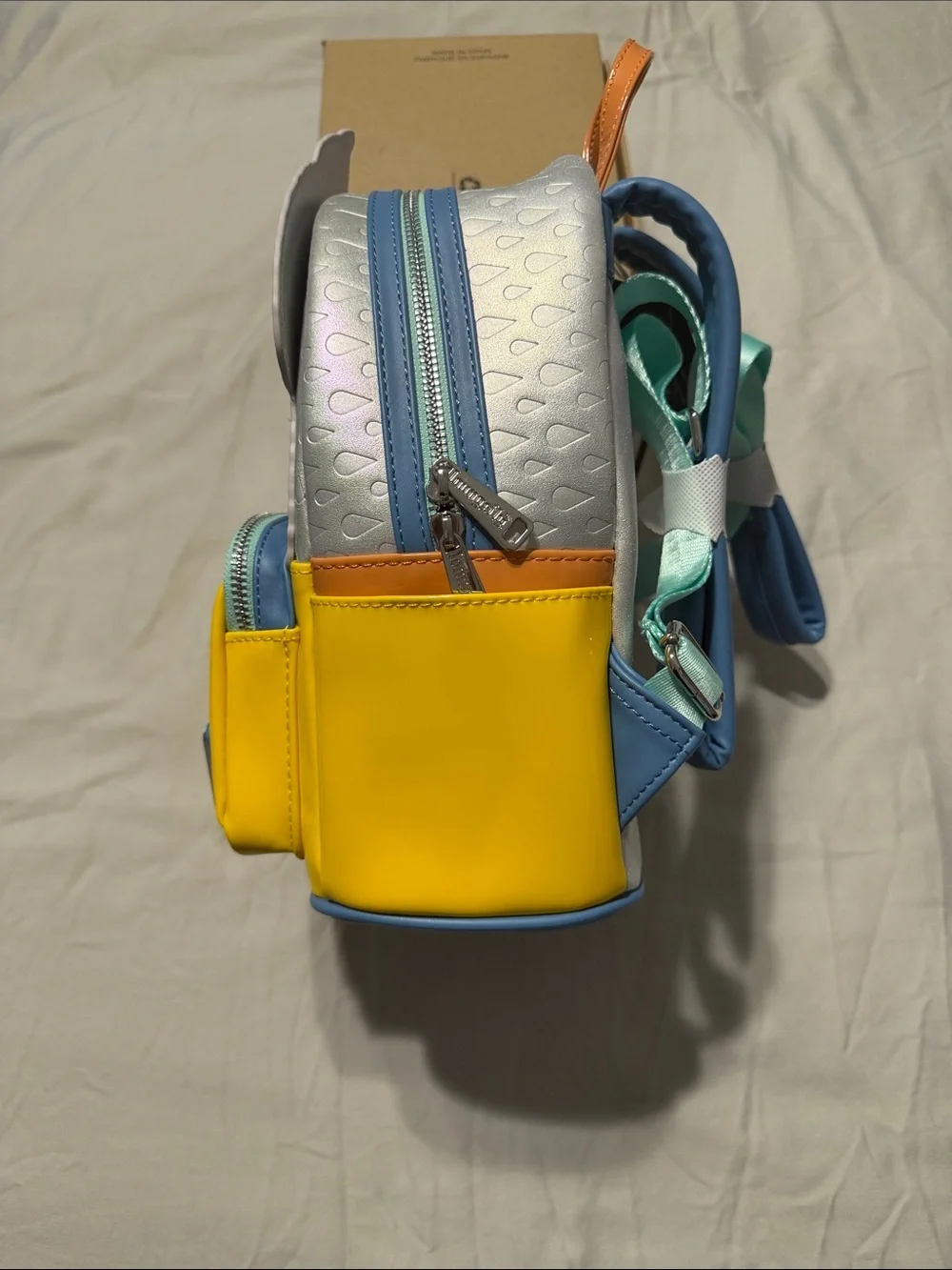 Loungefly Peanuts Snoopy Yellow and Blue Mini Backpack